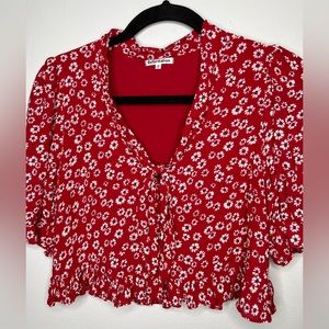 Reformation red top with daisy floral print in size Medium